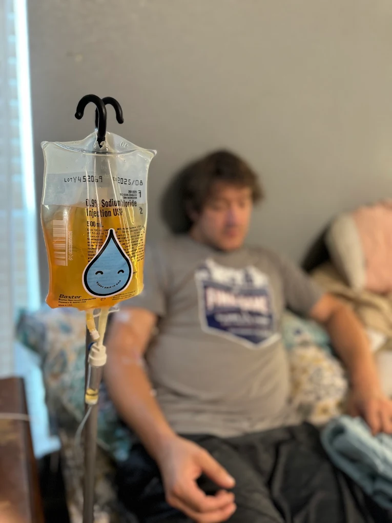 Patient receiving IV drip at Happy Drip IV & Wellness